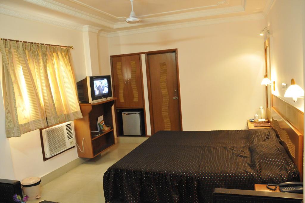 Hotel Heera Kalküta Oda fotoğraf