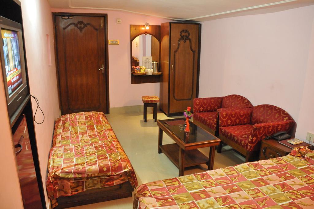 Hotel Heera Kalküta Oda fotoğraf